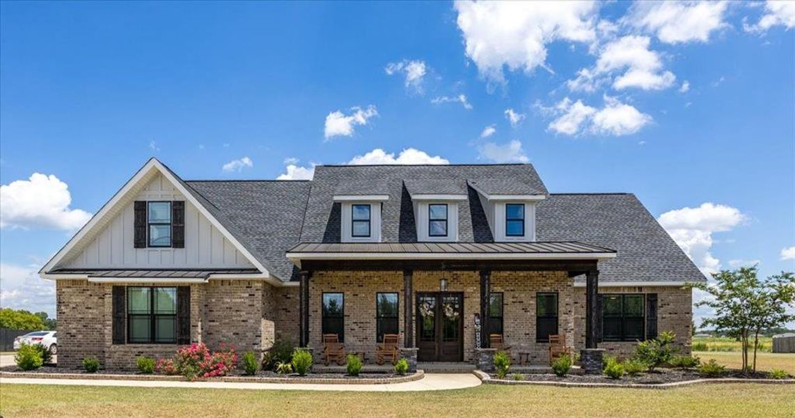 Front exterior of a new home in , Kathleen, GA, highlighting curb appeal (Image 2).