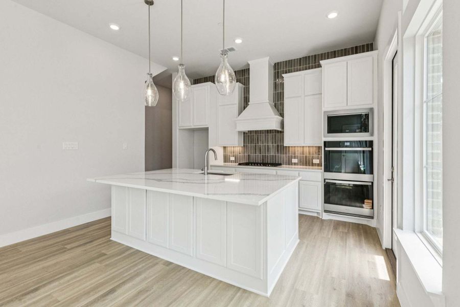 Furnished interior view inside a new home in Newman Village Townhomes, Frisco (Image 9).
