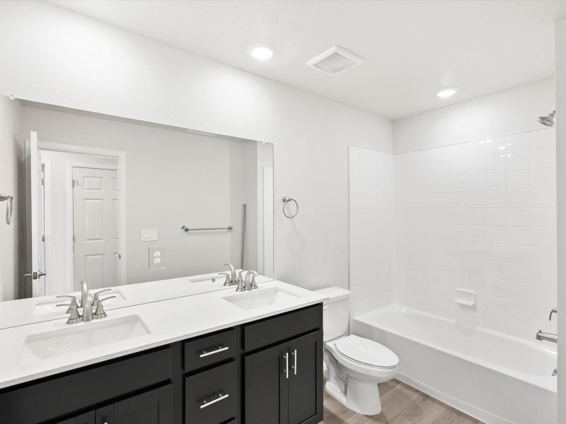 Furnished interior view inside a new home in Three Hills, Morrison (Image 9).