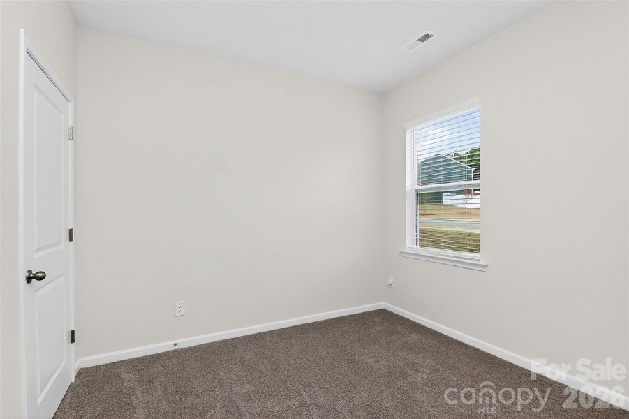 Spacious, unfurnished interior of a new home in Fergus Crossing, York (Image 22).