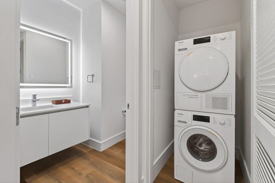 Laundry next to half bath