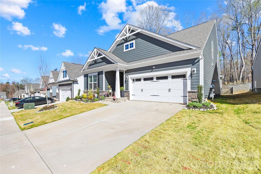 Front exterior of a new home in Villas at Prestwick, Mooresville, NC, highlighting curb appeal (Image 21).