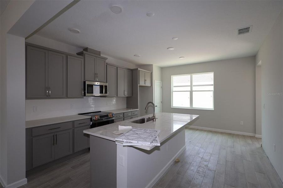 Furnished interior view inside a new home in Center Lake on the Park, St. Cloud (Image 4).