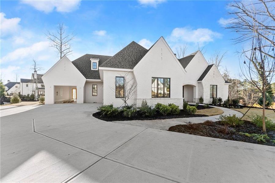 Front exterior of a new home in , Alpharetta, GA, highlighting curb appeal (Image 20).