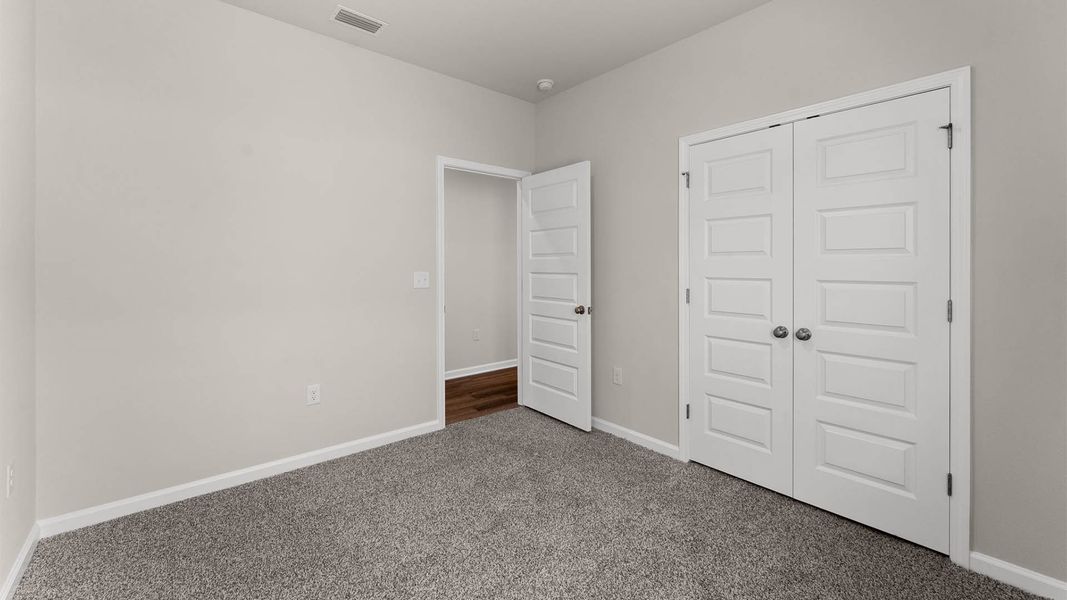 Representative unfurnished interior of a home built from the The Poppy by D.R. Horton in Liberty, Panama City (Image 18).