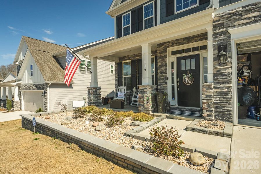 Exterior details and patio area of a home in Falls Cove, Troutman (Image 20).