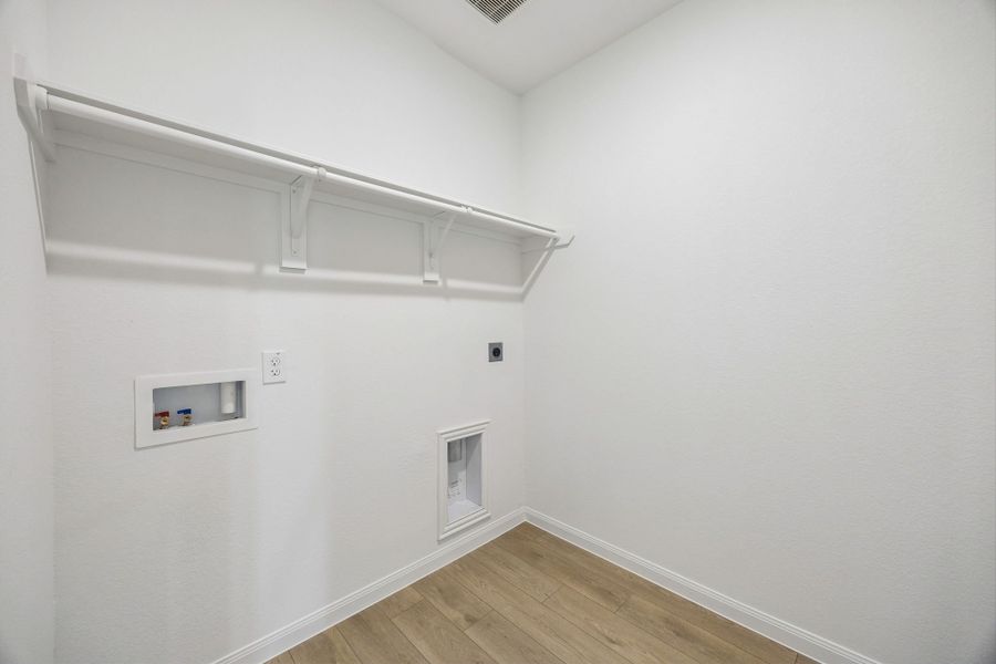 Spacious, unfurnished interior of a new home in Meridiana, Manvel (Image 22).