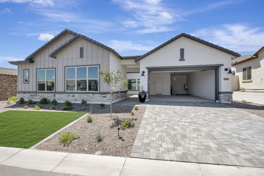 Front exterior of a new home in The Ridge at Victory, Buckeye, AZ, highlighting curb appeal (Image 2).