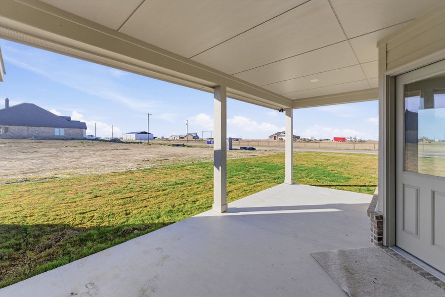 Exterior details and patio area of a home in Clear Sky Addition, Valley View (Image 19).