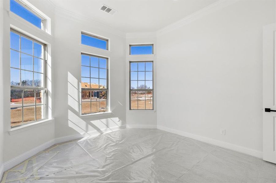 Game room featuring ornamental molding.