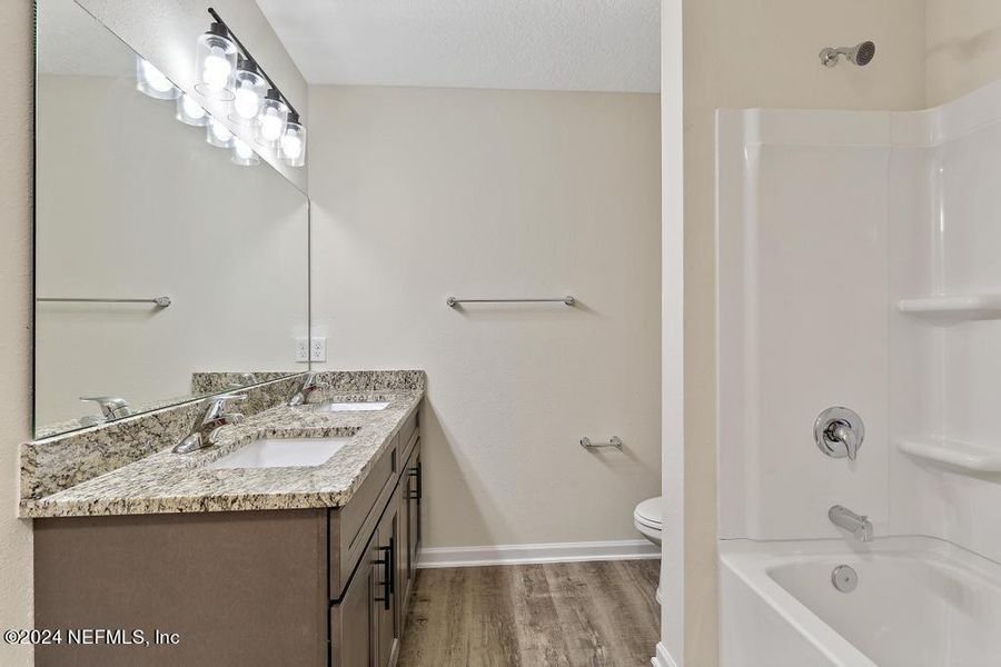 Furnished interior view inside a new home in , Satsuma (Image 10).