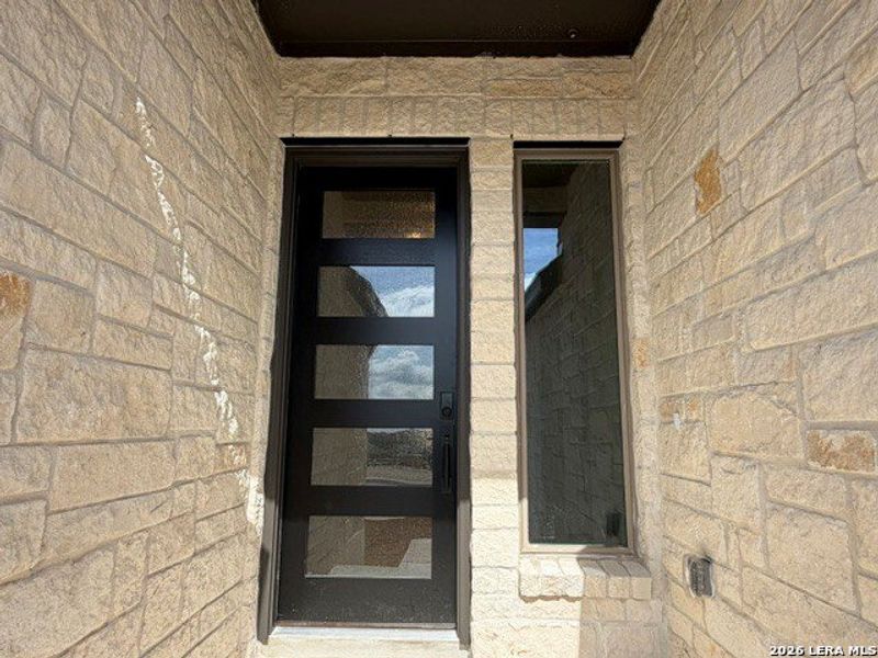 Exterior details and patio area of a home in Ladera - 50s, San Antonio (Image 3).