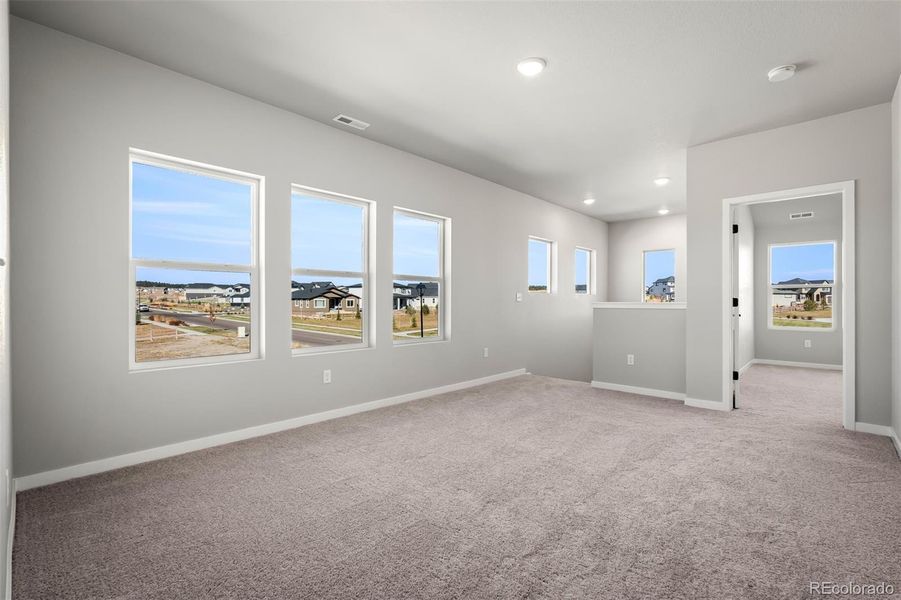 Spacious, unfurnished interior of a new home in Revel Crossing at Wolf Ranch – The Outlook Collection, Colorado Springs (Image 27).