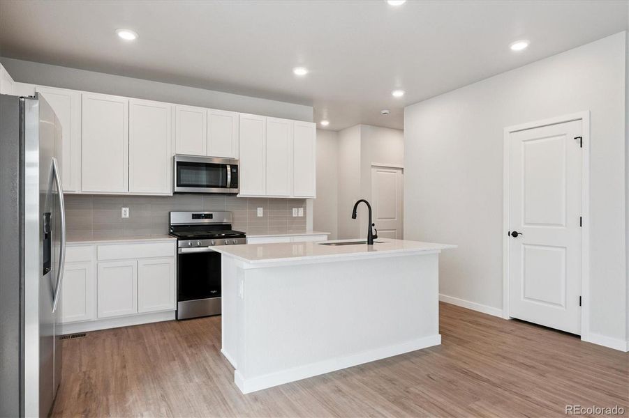 Furnished interior view inside a new home in Paired Homes at Alder Creek, Parker (Image 8). Furnished interior view inside a new home in Paired Homes at Alder Creek, Parker (Image 8).