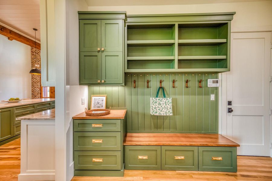 Mudroom with light wood-style flooring and beamed ceiling Mudroom with light wood-style flooring and beamed ceiling