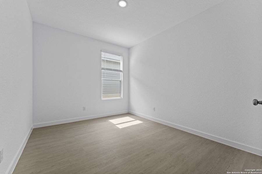 Spacious, unfurnished interior of a new home in Waterwheel: Coastline Collection, San Antonio (Image 10).