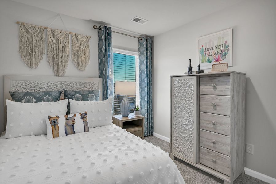 Representative furnished interior of a home built from the Jarrod by Veranda Homes in Trenton Place, Roebuck (Image 52).