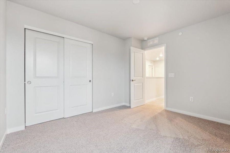 Spacious, unfurnished interior of a new home in Legato, Commerce City (Image 18).
