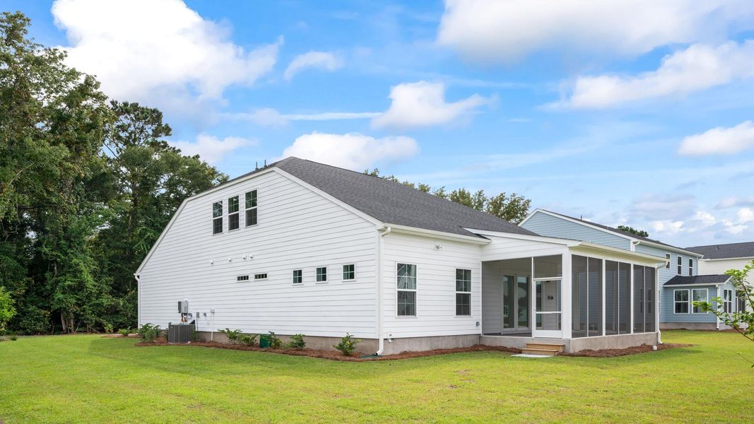 Exterior details and patio area of a home in Oak Bend, James Island (Image 3).
