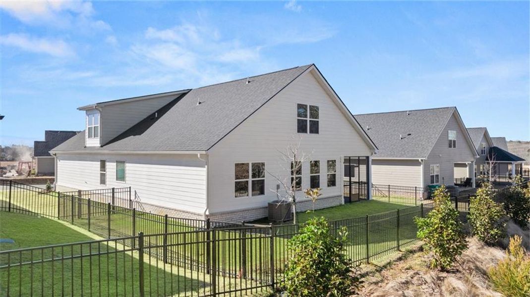 Exterior details and patio area of a home in Oak Ridge Meadows - Active Adult, Locust Grove (Image 22).