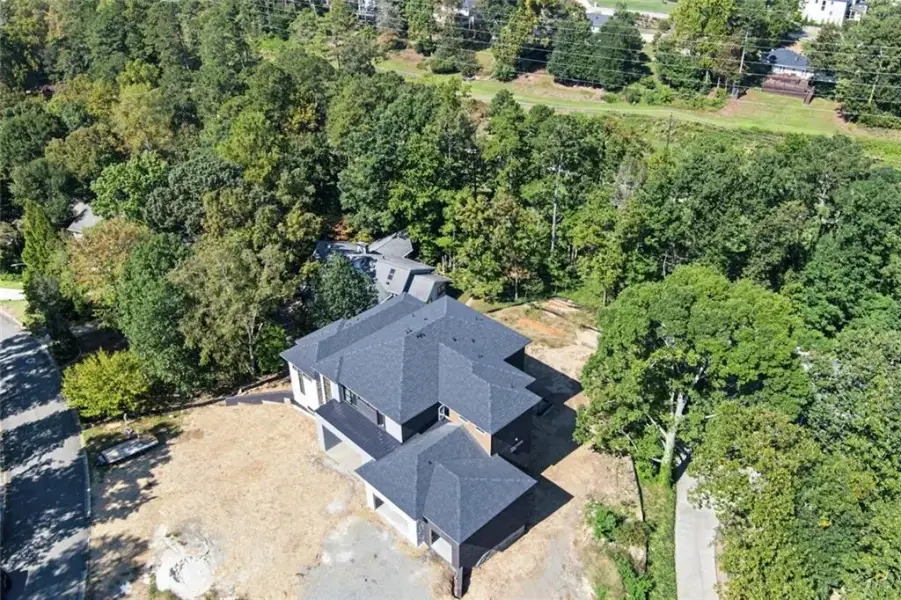 Front exterior of a new home in , Marietta, GA, highlighting curb appeal (Image 13).