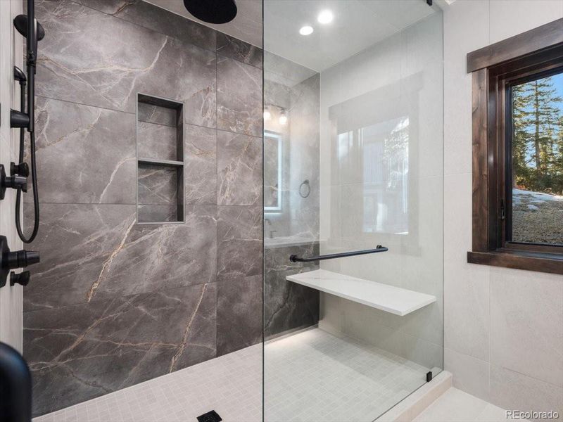 Primary bath featuring a steam shower Primary bath featuring a steam shower