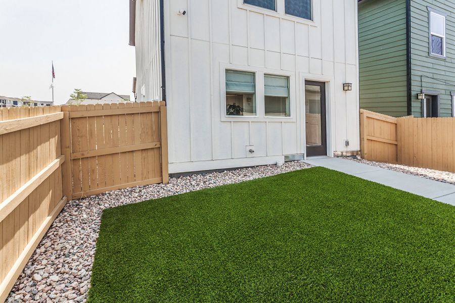 Exterior details and patio area of a home in Prairie Song, Windsor (Image 2). Exterior details and patio area of a home in Prairie Song, Windsor (Image 2).