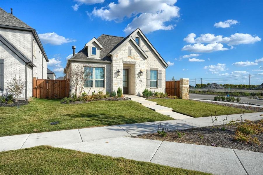 View of front of home featuring a front yard