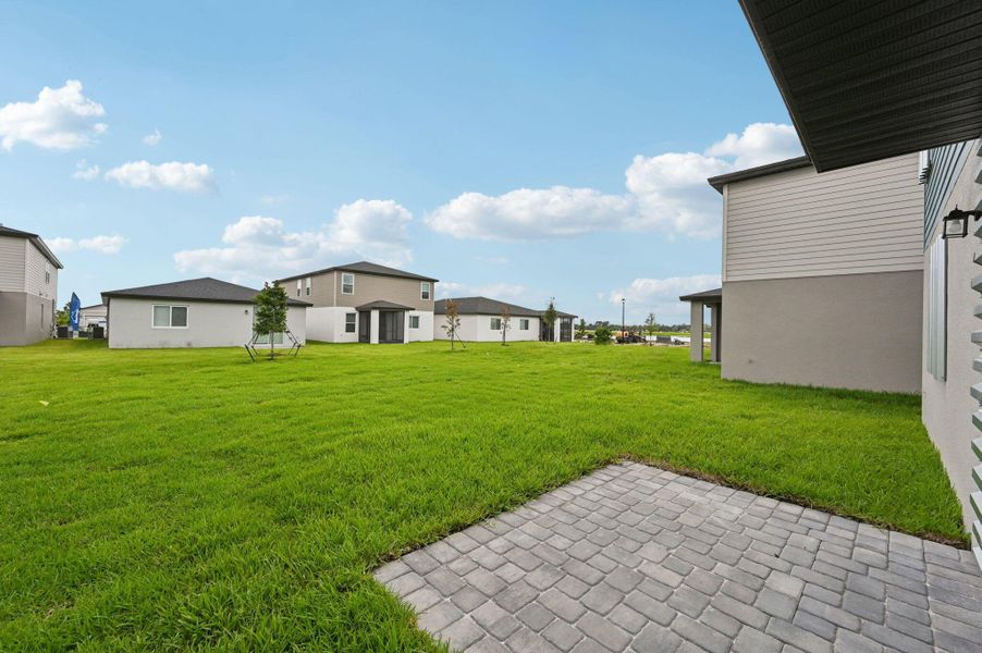 Front exterior of a new home in Meritage Homes at Terra Lago - Premier Series, Indiantown, FL, highlighting curb appeal (Image 2).