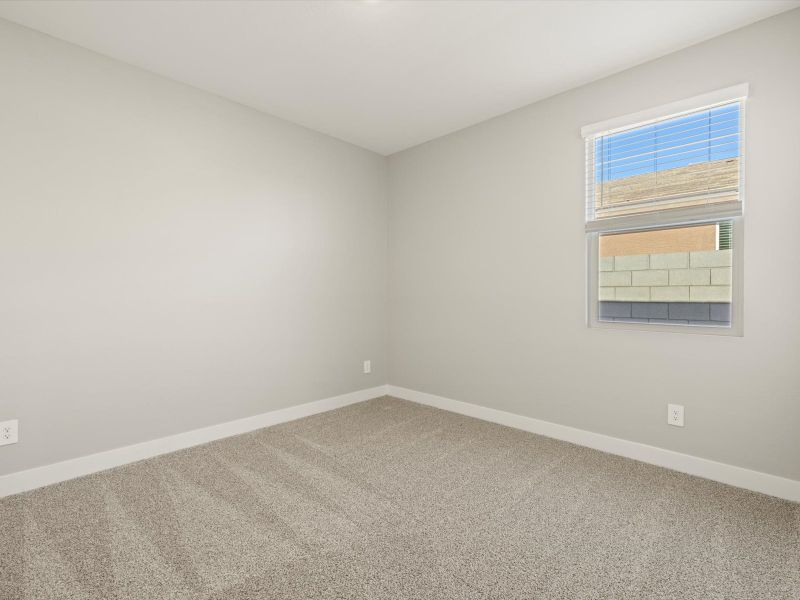 Spacious, unfurnished interior of a new home in White Tank Foothills Reserve Series, Waddell (Image 16).