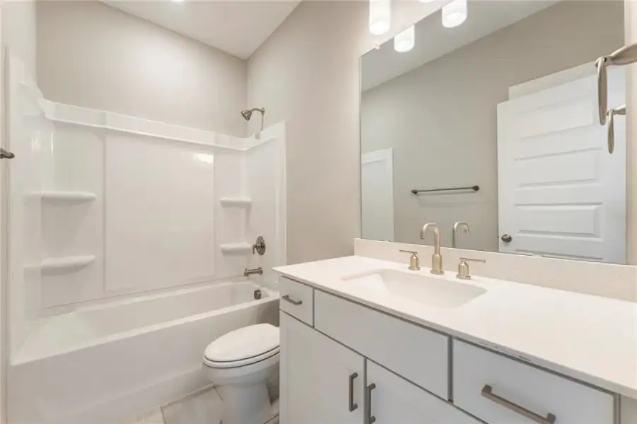 A well-appointed bathroom with a modern vanity and