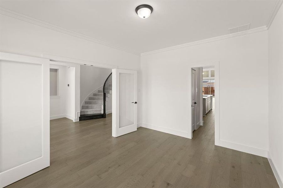 Spacious, unfurnished interior of a new home in Trails at Cottonwood Creek, Rowlett (Image 14).