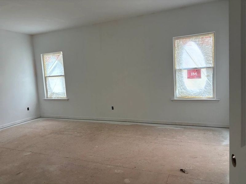 Primary Bed featuring the AW Collection® Serene - A tranquil retreat in soft, neutral textures. Primary Bed featuring the AW Collection® Serene - A tranquil retreat in soft, neutral textures.