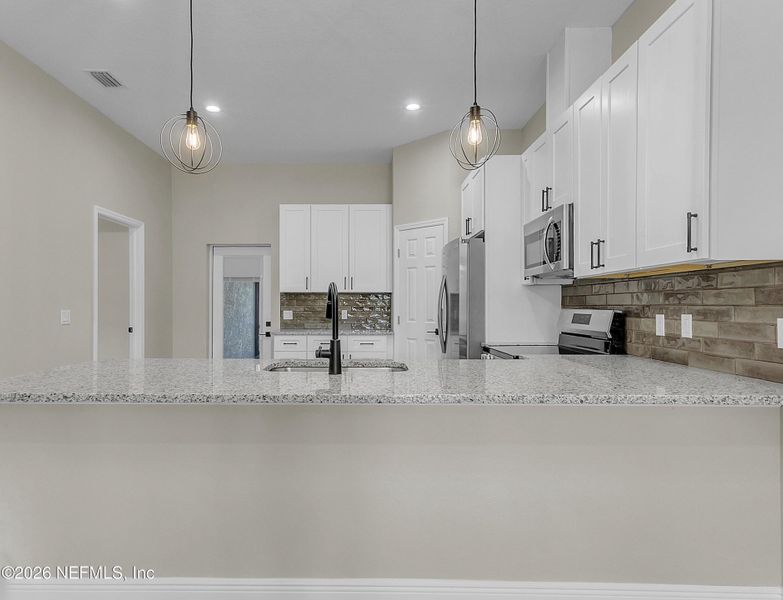 Furnished interior view inside a new home in , Palm Coast (Image 7).