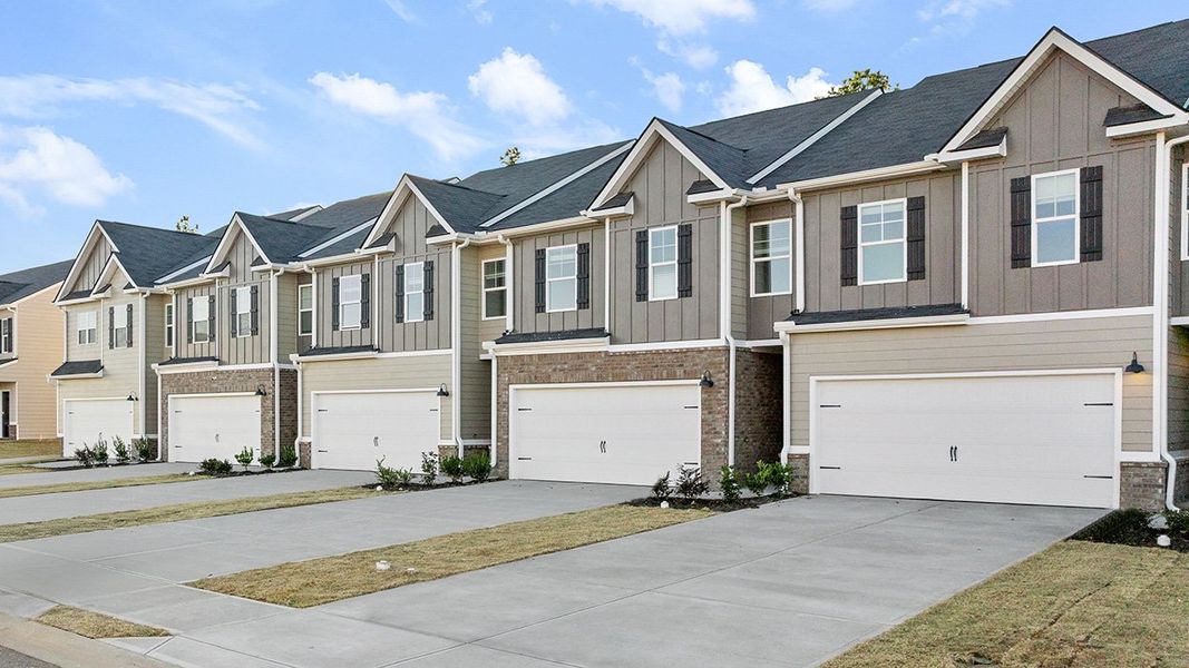 Front exterior of a new home in Laurel Park Townhomes, Hephzibah, GA, highlighting curb appeal (Image 2).