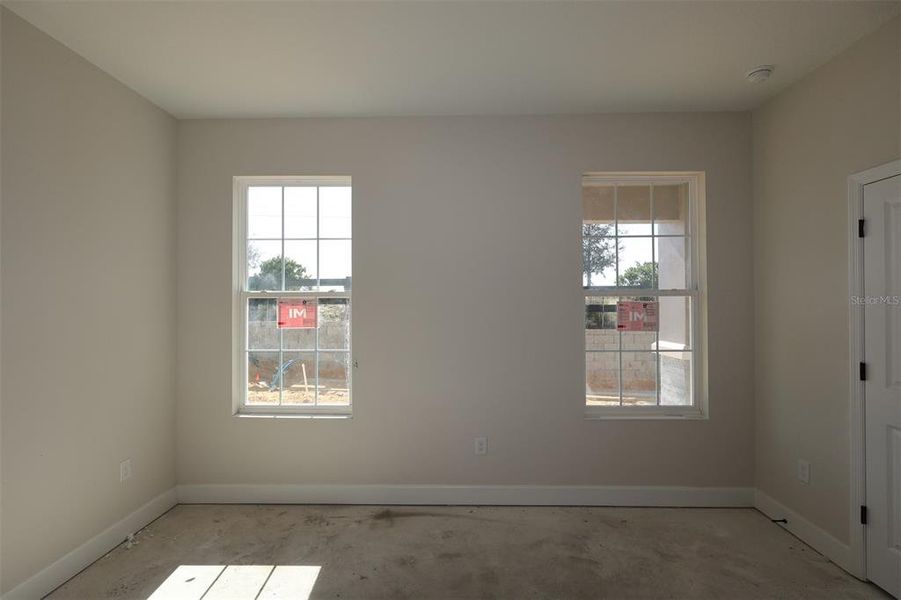 In-progress construction of a new home in Lake Star at Ovation, Winter Garden, FL (Image 14).