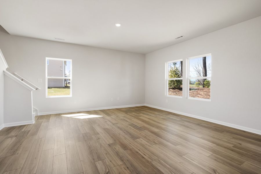 Spacious, unfurnished interior of a new home in Cambridge Reserve, Angier (Image 20).