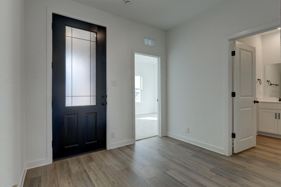 Representative unfurnished interior of a home built from the Hayes by Ashton Woods in The Preserve at the Wilder, Adkins (Image 7).