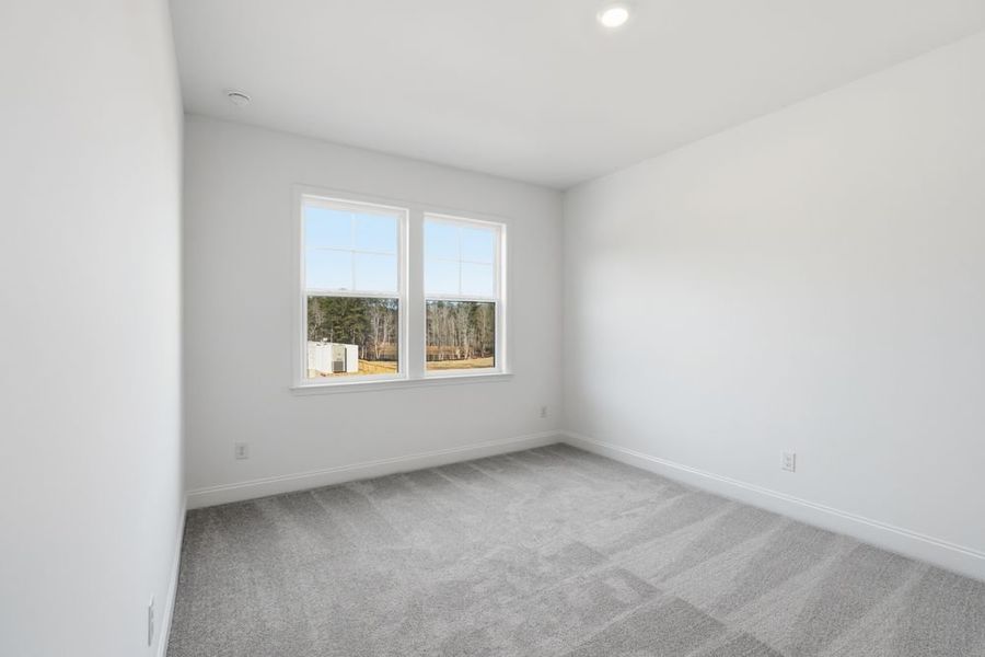 Representative unfurnished interior of a home built from the Stockbridge by Taylor Morrison in Watson Park, Snellville (Image 34).