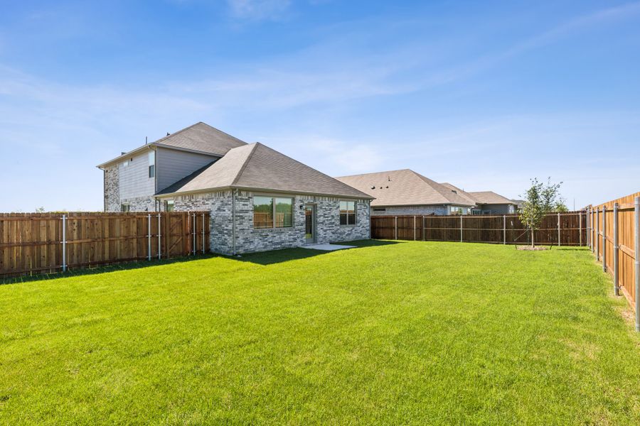Yard/ Flatwork in the Sapphire home plan by Trophy Signature Homes – REPRESENTATIVE PHOTO Yard/ Flatwork in the Sapphire home plan by Trophy Signature Homes – REPRESENTATIVE PHOTO