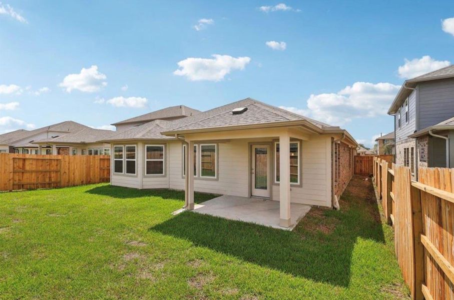 Exterior details and patio area of a home in Wall Street Village, Richmond (Image 4).