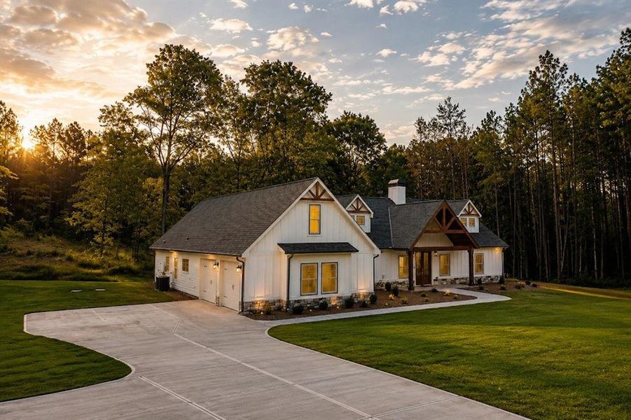 Front exterior of a new home in , Carrollton, GA, highlighting curb appeal (Image 37).