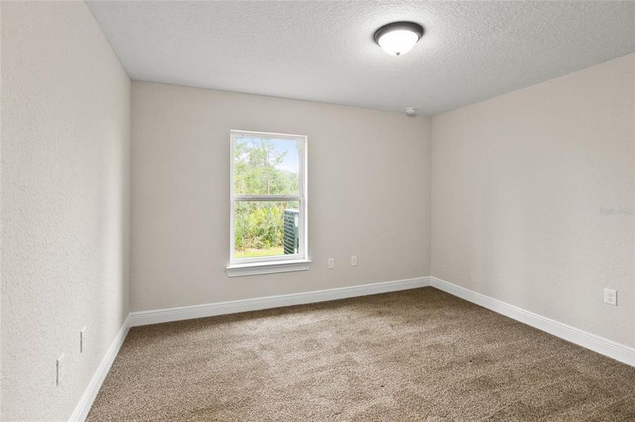 Spacious, unfurnished interior of a new home in Marion Oaks, Ocala (Image 5).