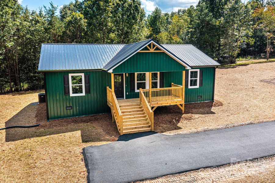 Front exterior of a new home in , Connelly Springs, NC, highlighting curb appeal (Image 2).