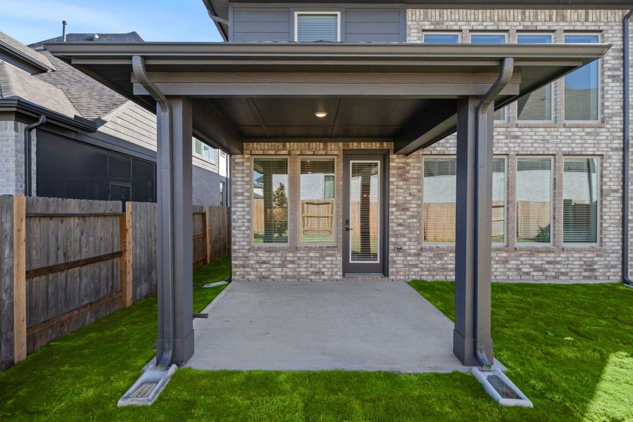 Exterior details and patio area of a home in Fulbrook on Fulshear Creek 60', Fulshear (Image 3). Exterior details and patio area of a home in Fulbrook on Fulshear Creek 60', Fulshear (Image 3).