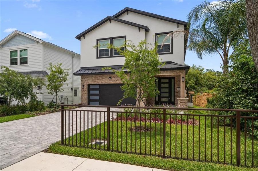 Front exterior of a new home in , Dunedin, FL, highlighting curb appeal (Image 2). Front exterior of a new home in , Dunedin, FL, highlighting curb appeal (Image 2).