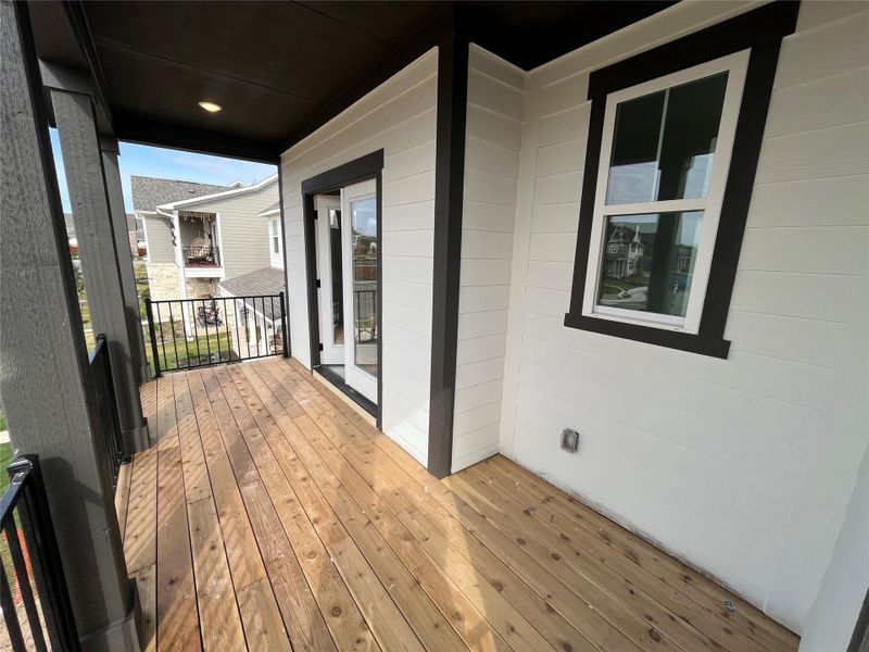 Exterior details and patio area of a home in The Cottages at Lariat, Liberty Hill (Image 7).