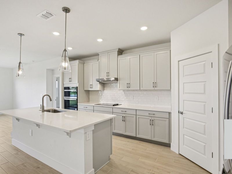 The Emilia Floorplan Kitchen at 449 Sun Chaser Dr.