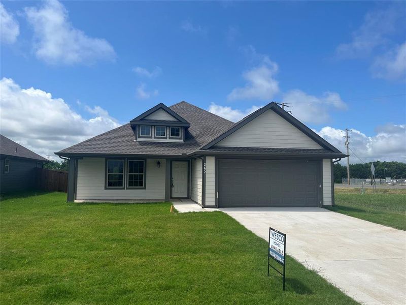 Front exterior of a new home in , Trenton, TX, highlighting curb appeal (Image 1). Front exterior of a new home in , Trenton, TX, highlighting curb appeal (Image 1).