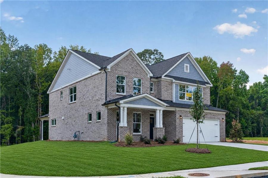 Front exterior of a new home in , Loganville, GA, highlighting curb appeal (Image 25). Front exterior of a new home in , Loganville, GA, highlighting curb appeal (Image 25).